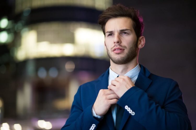 Business Casual Man Adjusting Tie