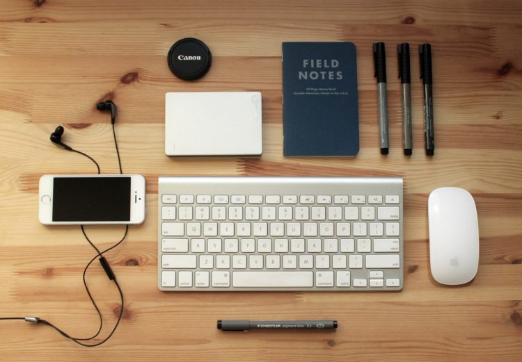 Gadgets as mouse, keyboard, headphones and smart phone.