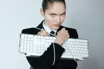 girl holding keyboard