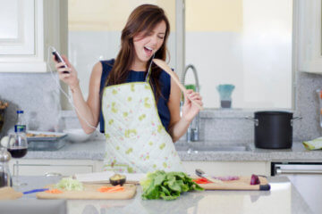 girl listening music kitchen