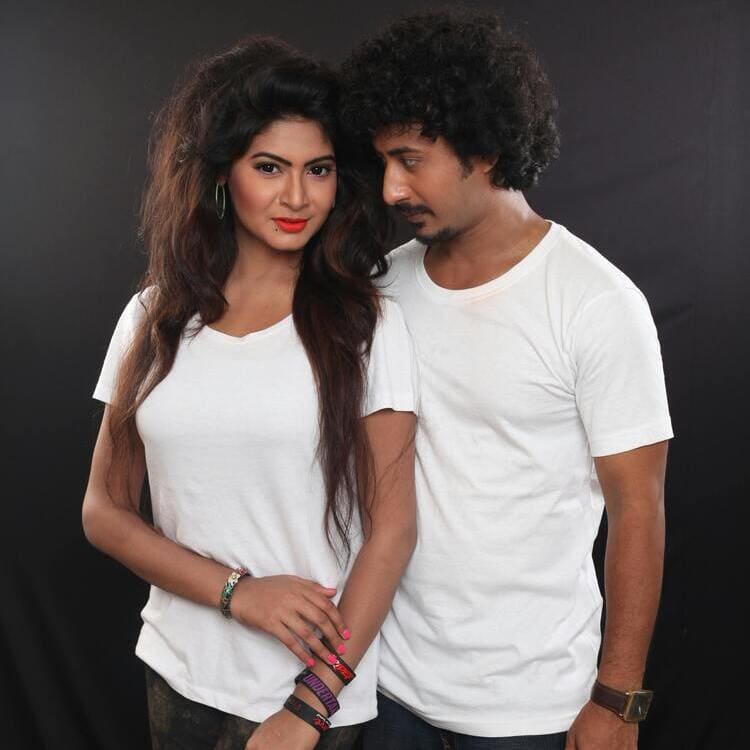 Man and Woman Wearing White Crew-neck T-shirts