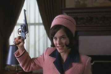 parker posey holding gun