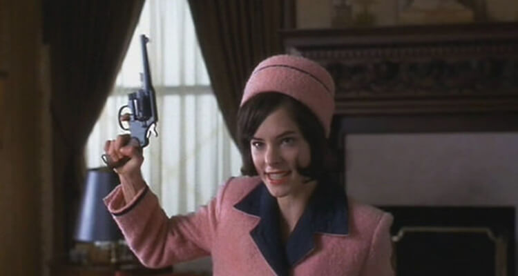 parker posey holding gun