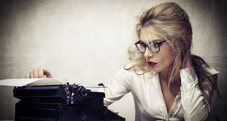 woman operating typewriter